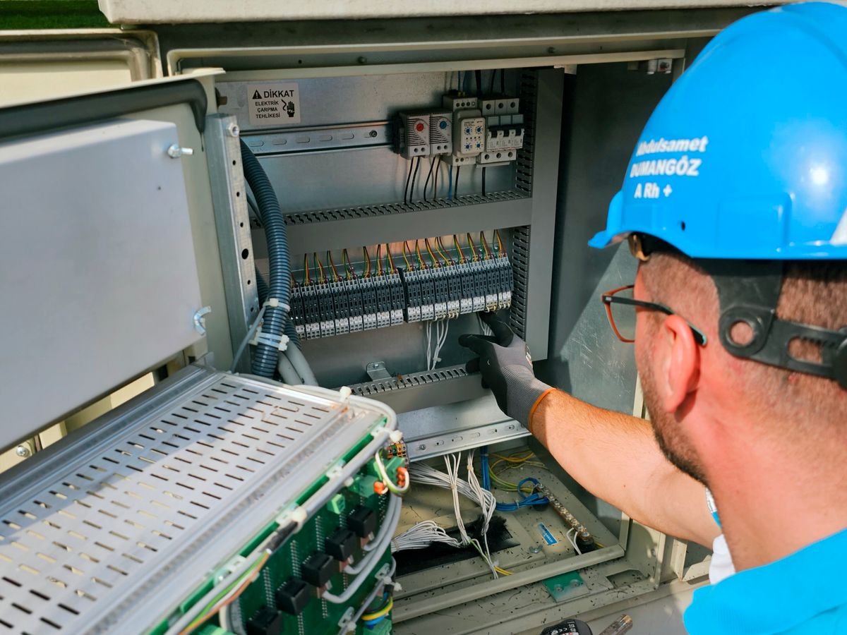 Arcwell electrician performing emergency make-safe work on an outdoor switchboard