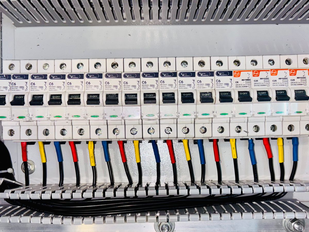 Neat color-coded circuit breaker panel — Arcwell workmanship standard